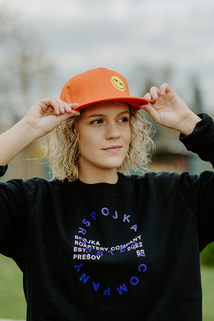 Cap with a smiley face